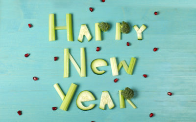 Happy New Year sign made from celery, cucumber and broccoli