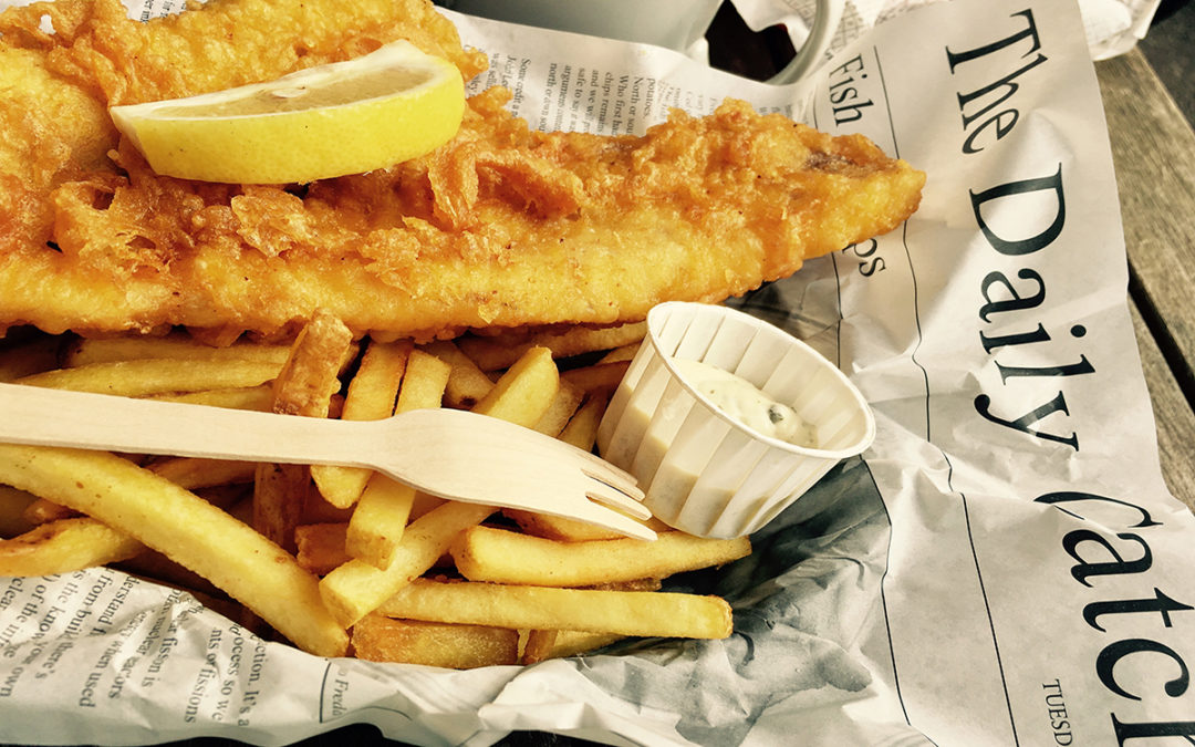 Fish and chips wrapped in newspaper